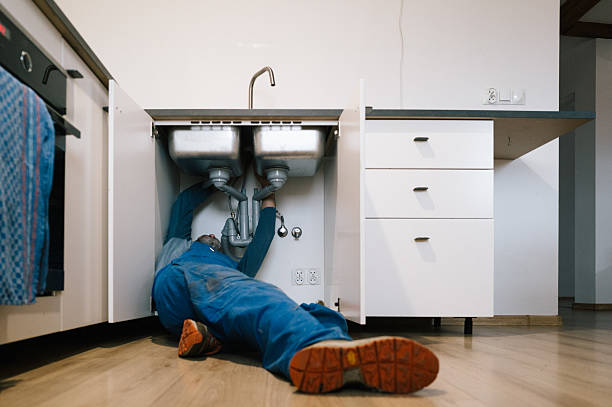 Professional Drain Cleaning technician working in Zirconia, NC